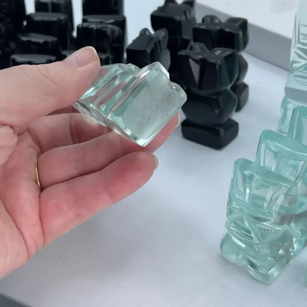Aztec style chess pieces black obsidian green glass or onyx.